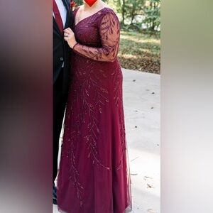 Adrianna Papel Platinum gown.